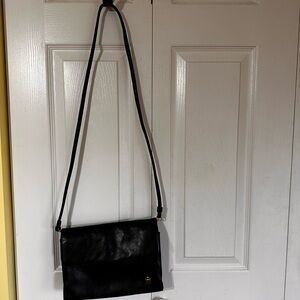 Elegant Black Leather Crossbody Bag with Gold Accent